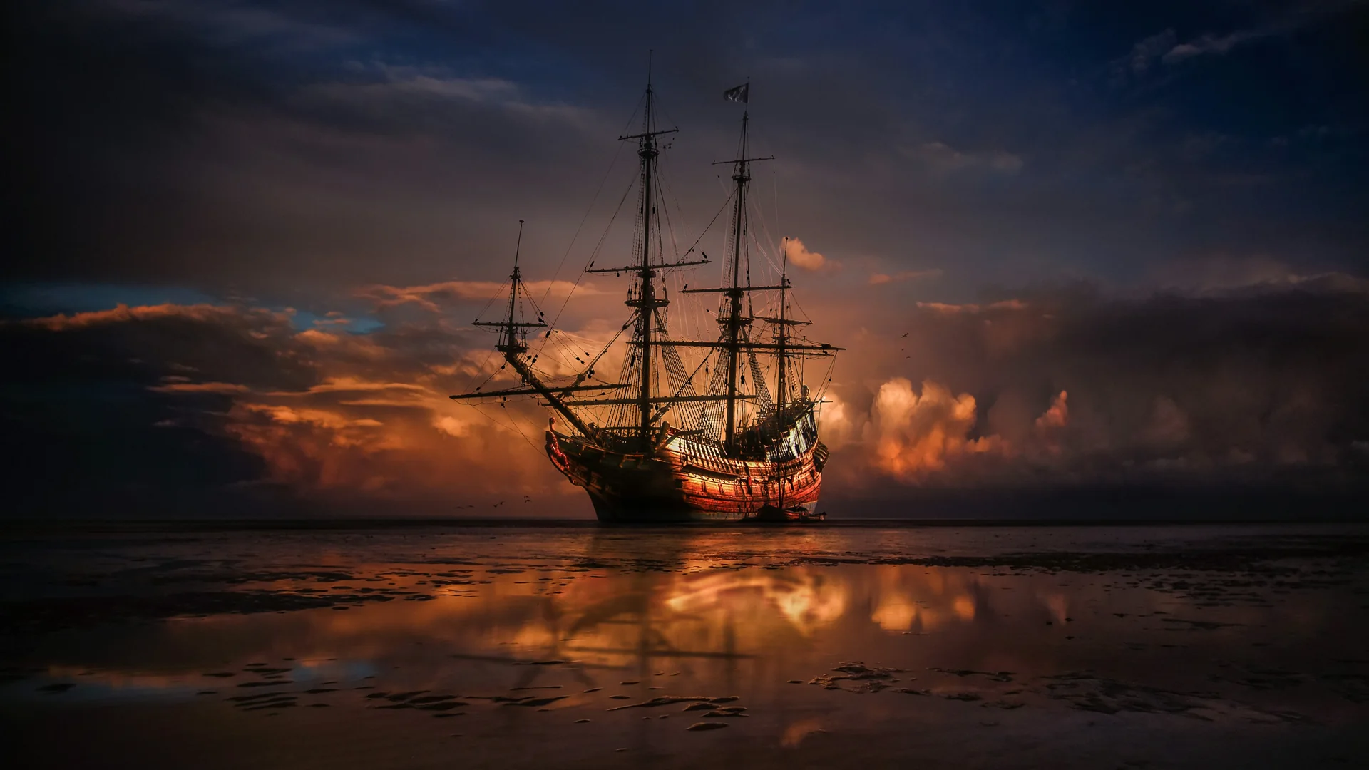 Un barco pirata de altos mástiles con el velamen desplegado entrando en puerto — imagen representativa del decorado del barco montado dentro del Pirates Theatre, no del recinto en sí